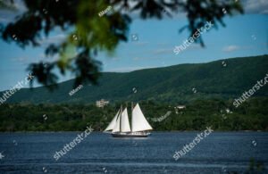 The schooner Apollonia sails north up the Hudson River in Newburgh, NY