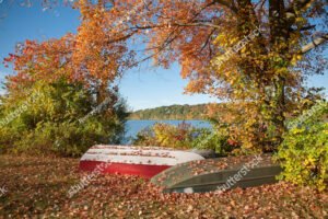 Two unused row boats next to the lake in Putnam County, NY